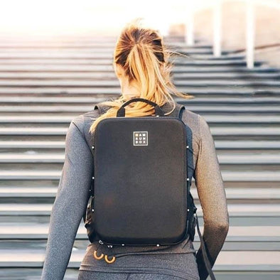 Woman wearing IAMRUNBOX Backpack Pro